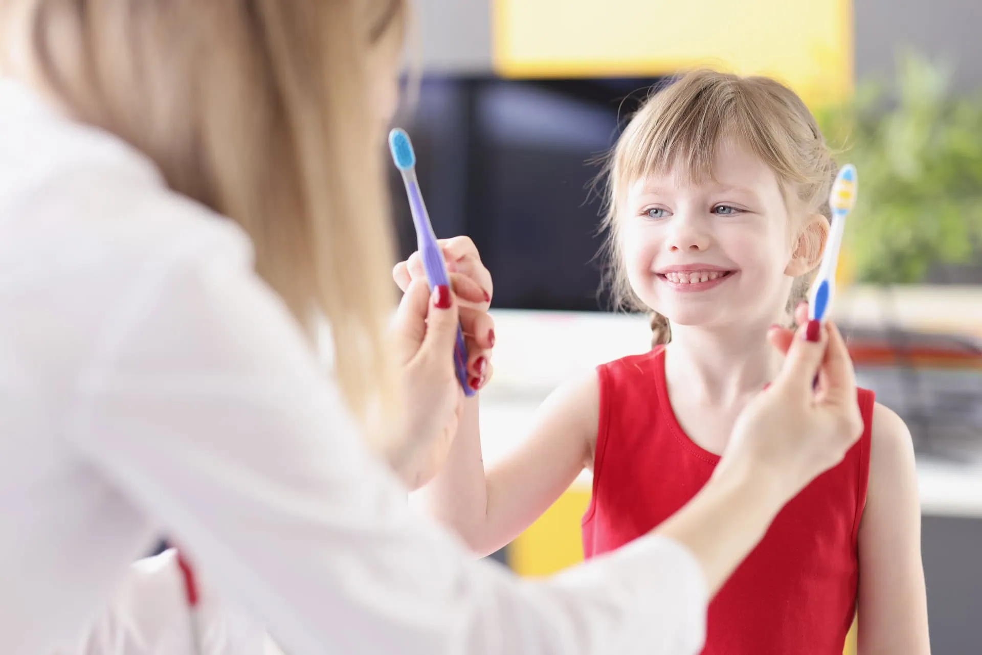 Child receiving a gentle cleaning in a kid-paced dental visit